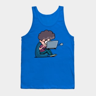 boy sits on a lazy bag and sends an email Tank Top